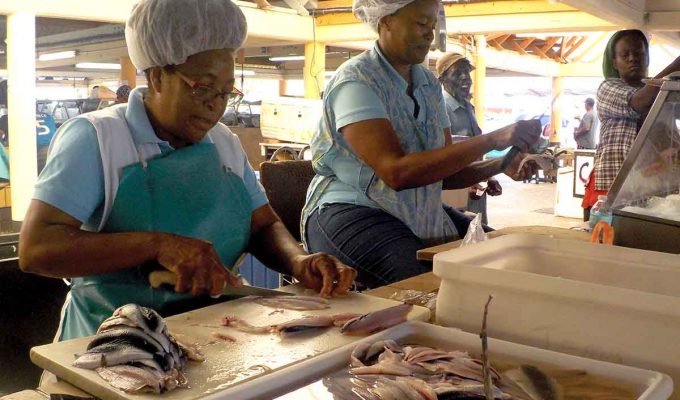 Fish vendor in Oistins in Barbados