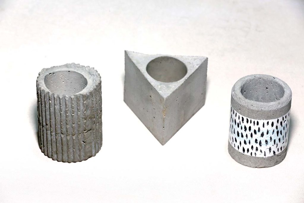 Cement plant pots by Barbadian artist Kraig Yearwood