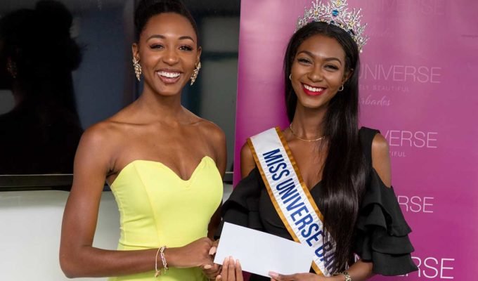 Contestants of the Miss Universe Barbados receiving their prizes.