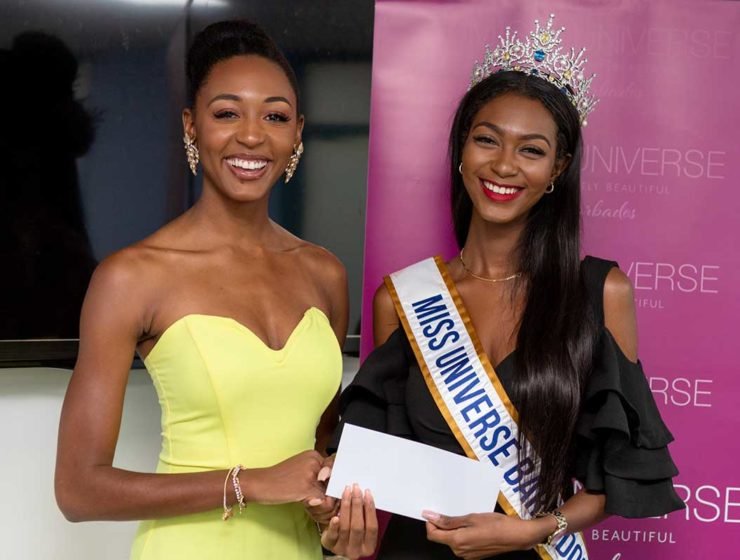 Contestants of the Miss Universe Barbados receiving their prizes.