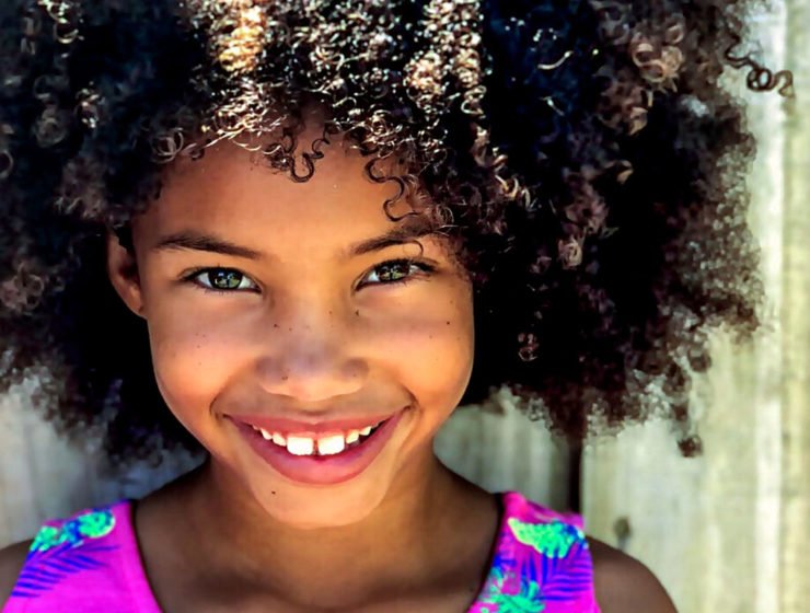 Little brown girl with big curly hair