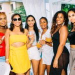 Six ladies posing at party